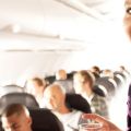 A320DomesticFlight-Attendant-serves-refreshments-0133807.jpg